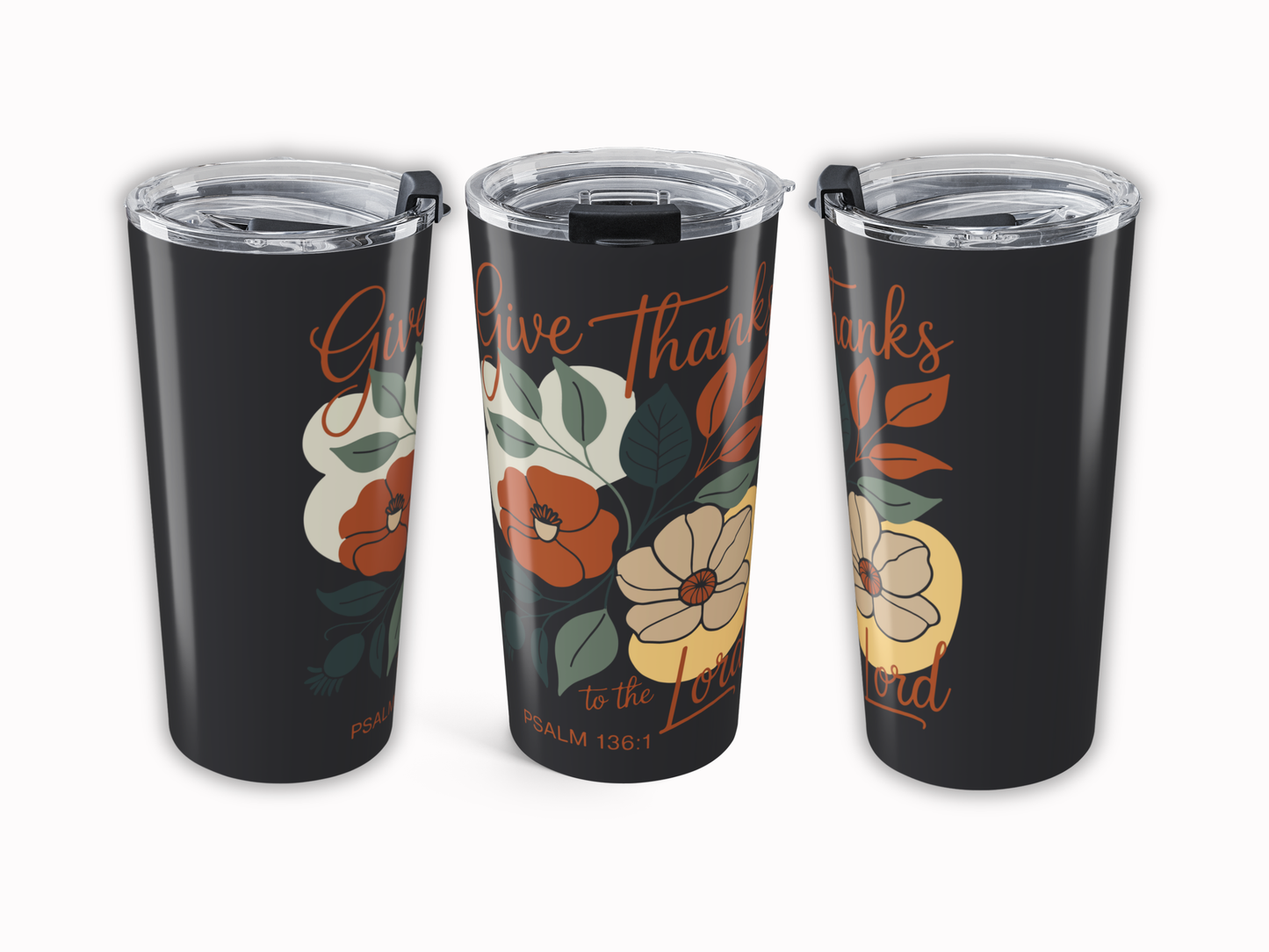 Three black tumblers with floral designs and text on a white background