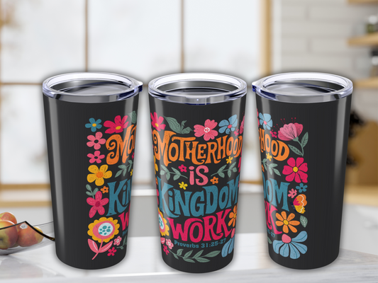 Three black 20oz Stainless Steel Tumblers with colorful floral designs and text "Motherhood is Kingdom Work" and "Proverbs 31:25-27" sit on a light countertop.