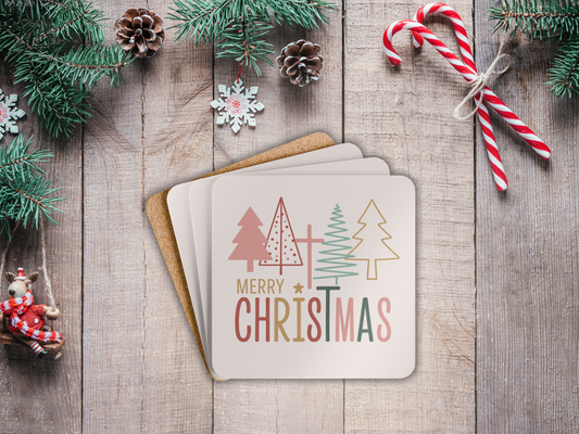 Stack of Christmas-themed coasters with cross on a wooden surface with festive decorations.