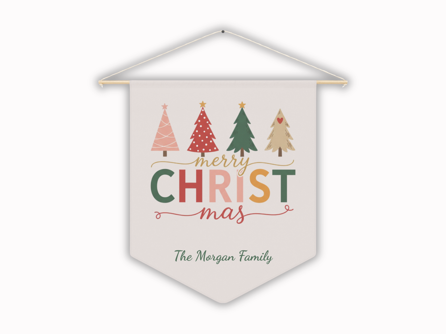Decorative banner with Christmas trees and 'Merry Christmas' text on a soft pink background