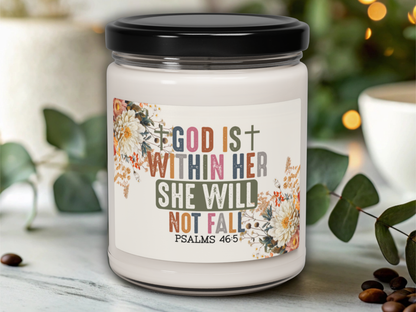 Candle jar with motivational quote on a blurred background