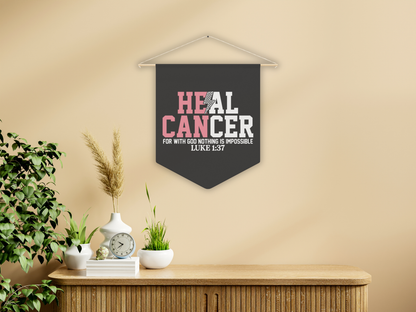 Decorative pennant flag with motivational quote on a wall above a wooden cabinet.