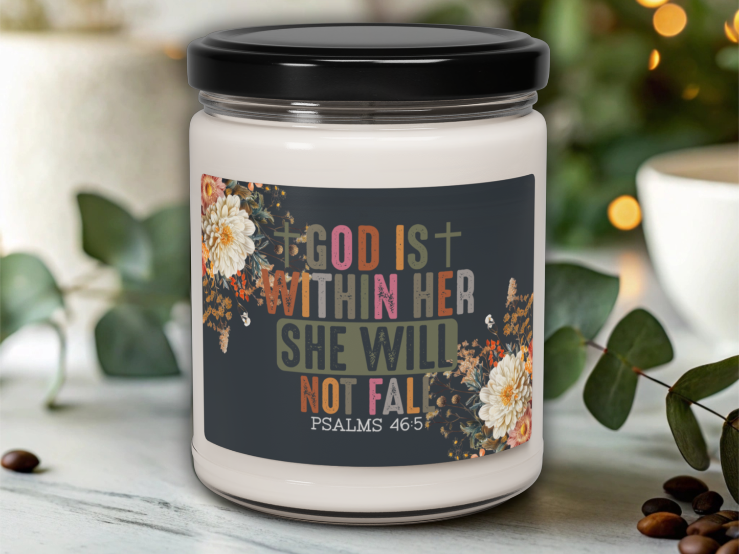 Candle jar with motivational label on a blurred background