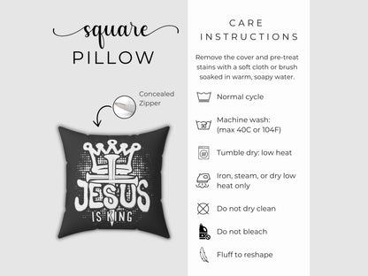 Black pillow with 'Jesus is King' text and care instructions on a gray background