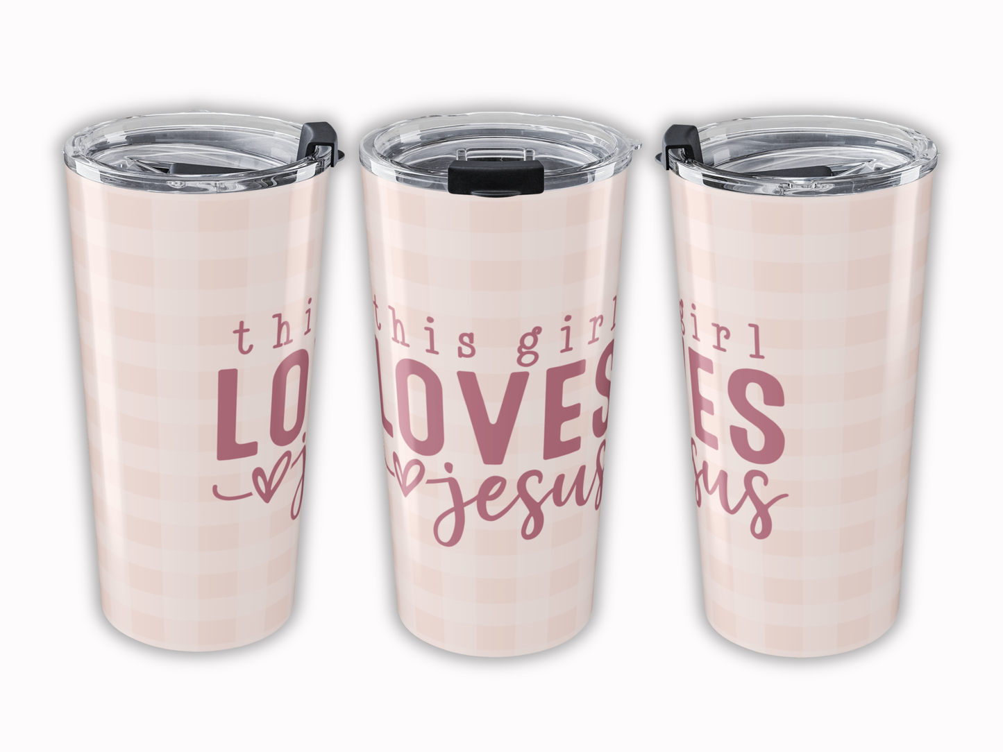 Three pink plaid tumblers with 'this girl loves Jesus' text on a white background