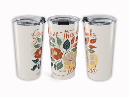 Three insulated tumblers with floral designs and text on a white background