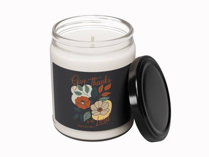 Candle in a jar with a decorative label on a white background