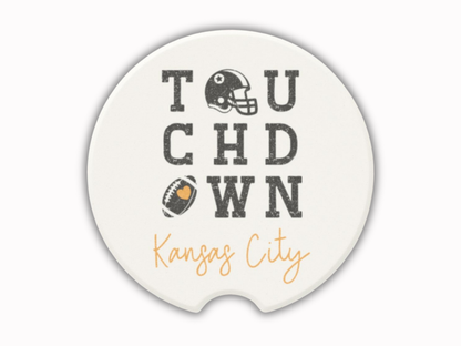 Ceramic car coaster with 'Touchdown Kansas City' text and football graphics on a white background