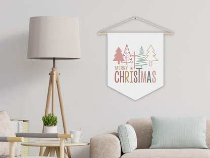 Hanging Christmas banner with trees and 'Merry Christmas' text in a living room setting.