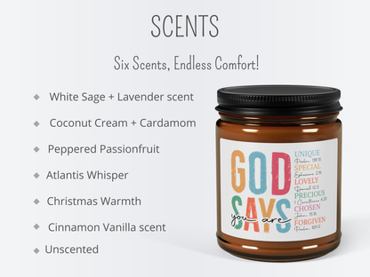 Brown jar candle labeled "GOD SAYS" with words like "UNIQUE" and "LOVELY." Text lists scents: White Sage + Lavender, Coconut Cream + Cardamom, and more. Peaceful tone.