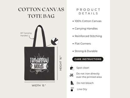 Black cotton canvas tote bag with "Tomorrow Needs You" printed in white. It features 20" handles, reinforced stitching, and measures 15" by 16". Product details and care instructions, such as spot cleaning, are listed beside it. The tone is practical and motivational.