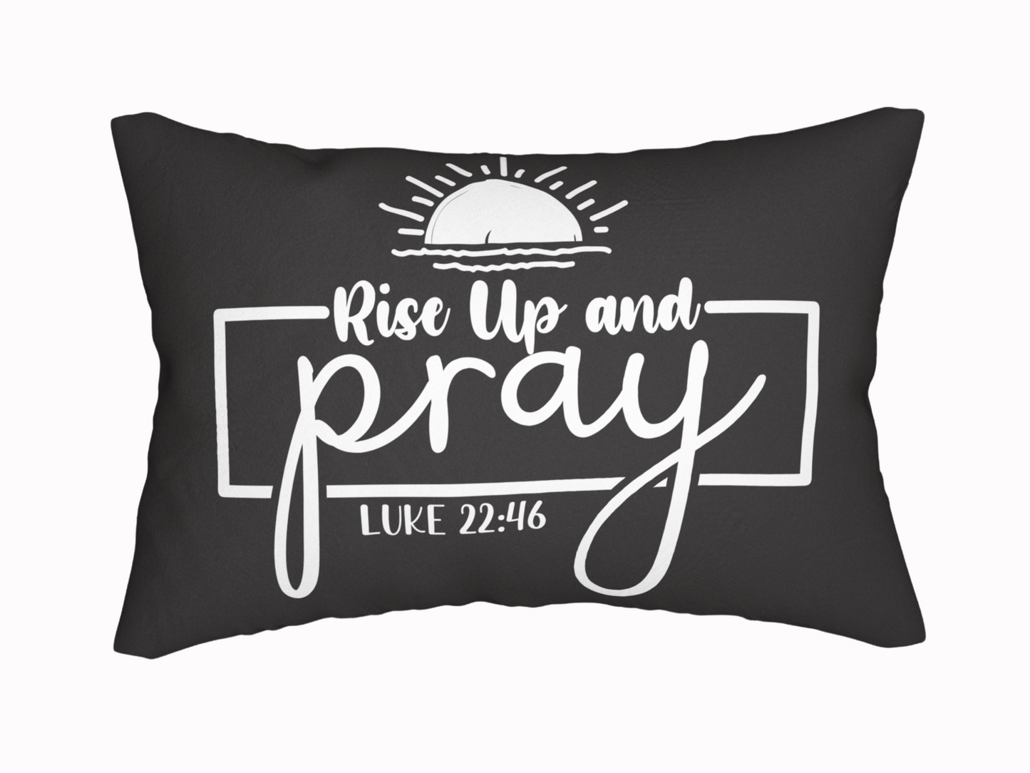 Black pillow featuring the phrase "Rise Up and Pray" in white, stylized text, with a rising sun graphic above and "Luke 22:46" below, conveying inspiration.