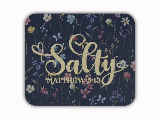 A dark blue square with rounded corners featuring the words "Salty" and "Matthew 5:13" in large, elegant beige script. Colorful flowers and delicate stems surround the text, creating a whimsical, serene atmosphere.