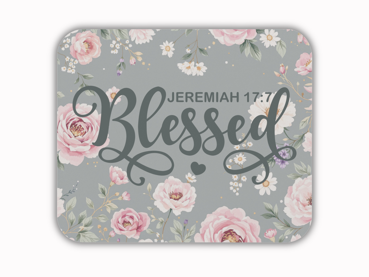 Floral-themed image with "Blessed" in elegant script, featuring pale pink roses and white flowers on a gray background. Reference: Jeremiah 17:7.