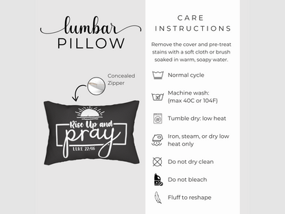 Lumbar pillow with "Rise Up and Pray" text and sun design on black. Includes care instructions: wash normal cycle, low heat dry, no bleach.