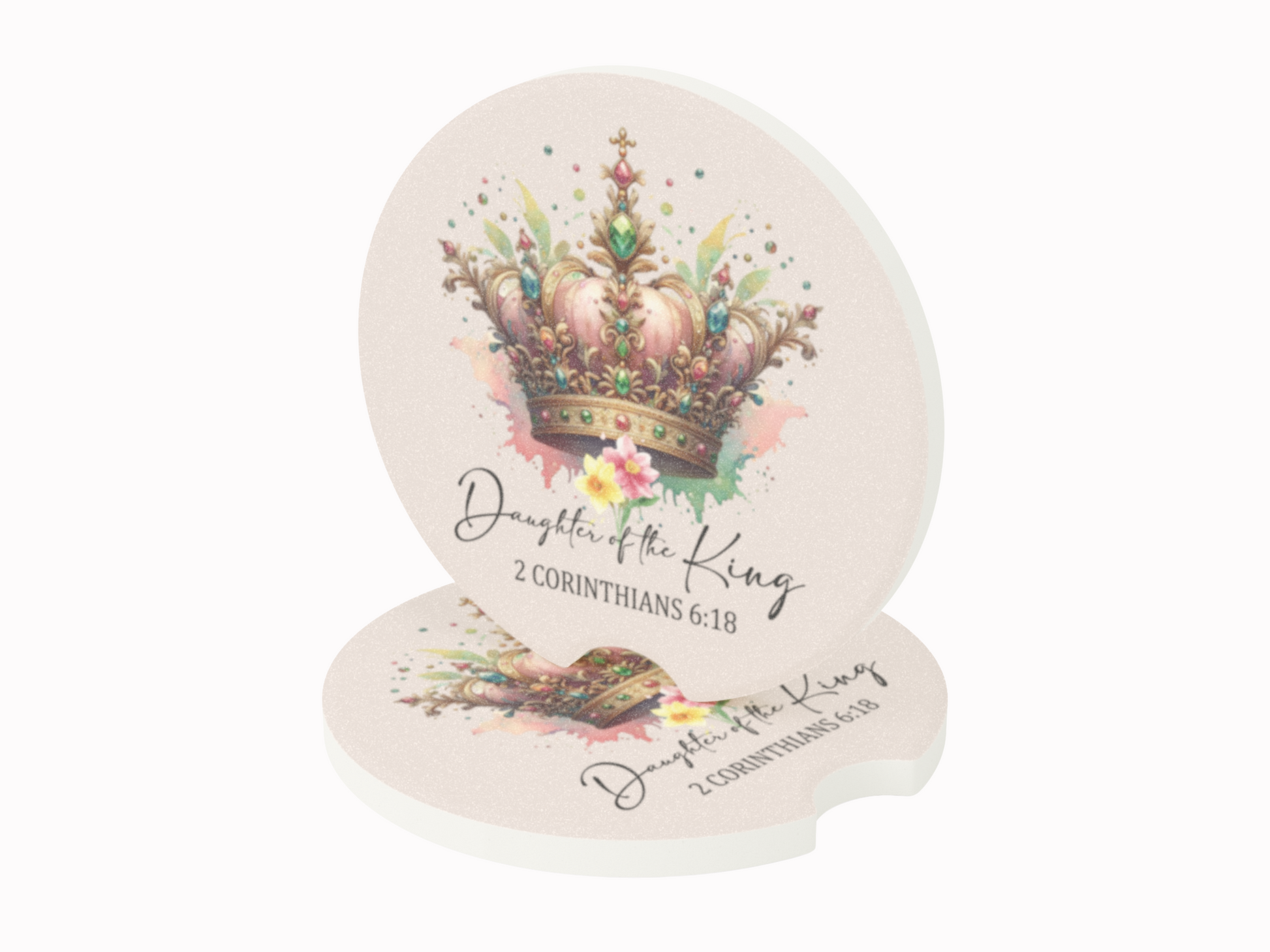 Elegant round coasters feature a watercolor crown with colorful splashes and text "Daughter of the King, 2 Corinthians 6:18." Regal and inspirational.