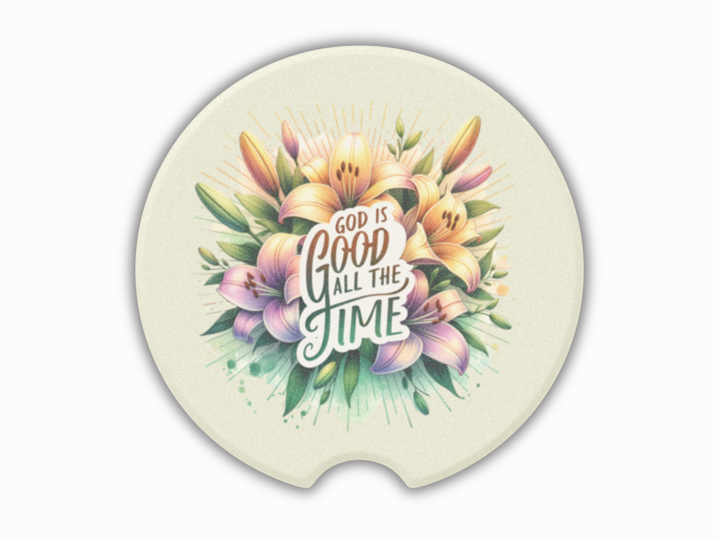 Round car coaster featuring vibrant lilies and leaves, centered around the text "God is good all the time," conveying a positive and uplifting message.