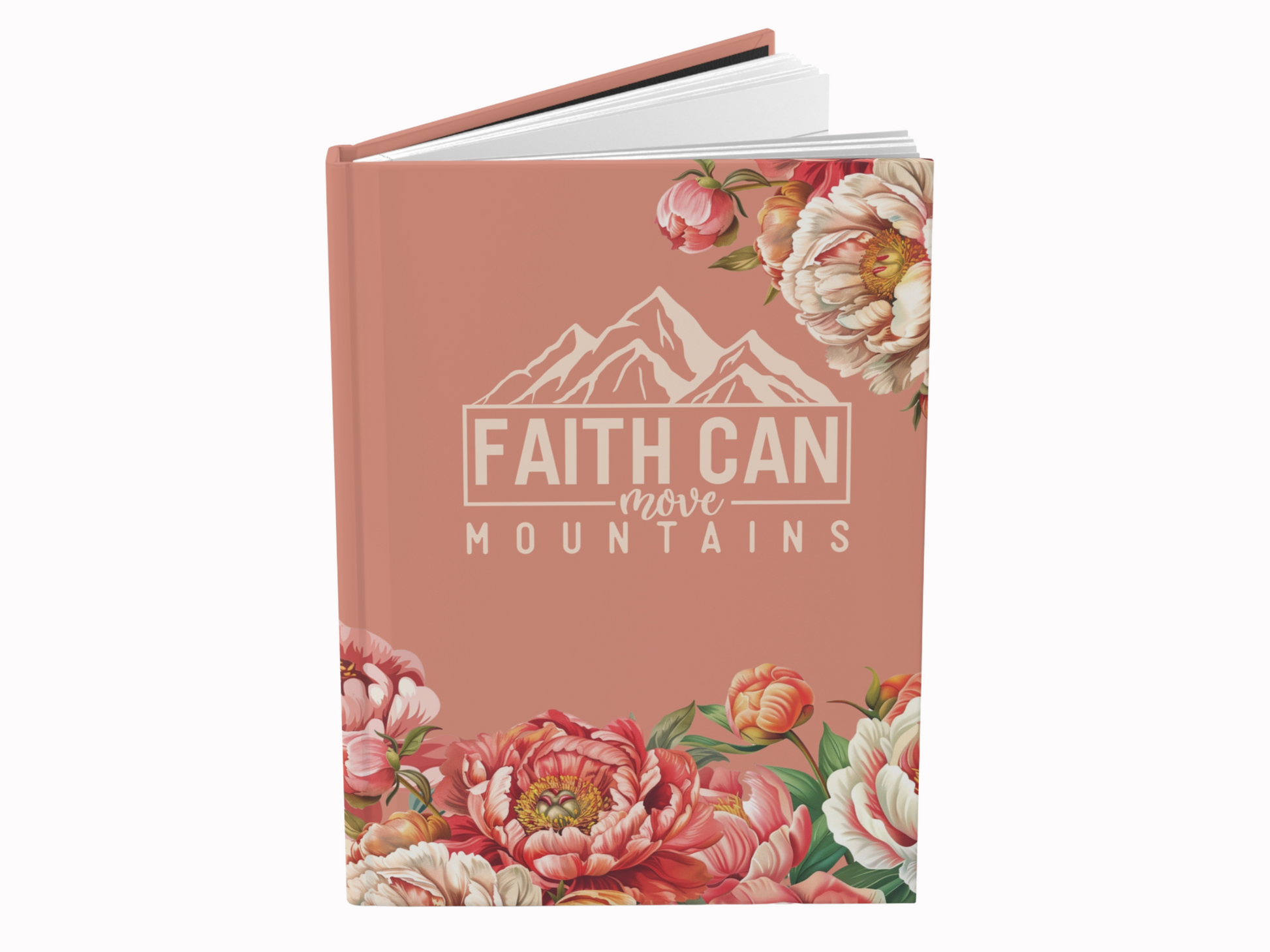 A salmon-colored journal with blooming peonies at the bottom. Features mountain outlines and the text "Faith Can Move Mountains" in bold, white lettering.