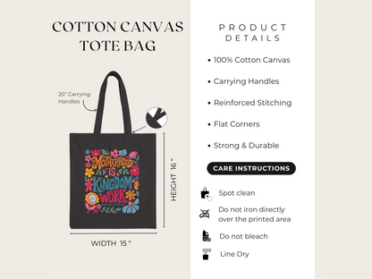 Cotton canvas tote bag with colorful floral design and text "Motherhood is Kingdom Work." Features include 20" handles and reinforced stitching.