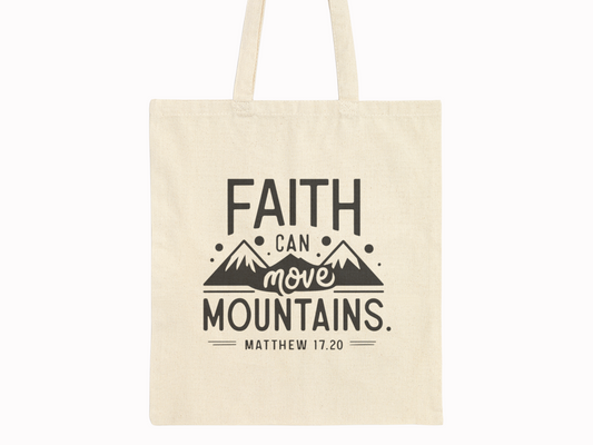Canvas  bag with bold text: “Faith can move mountains. Matthew 17:20.” Features simple mountain illustration, conveying inspiration and hope.