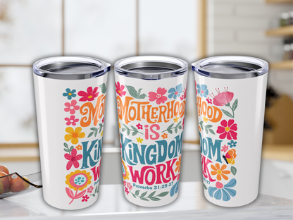 Three insulated cups with floral designs and motivational text: "Motherhood is Kingdom Work." Bright colors create a cheerful, uplifting tone.