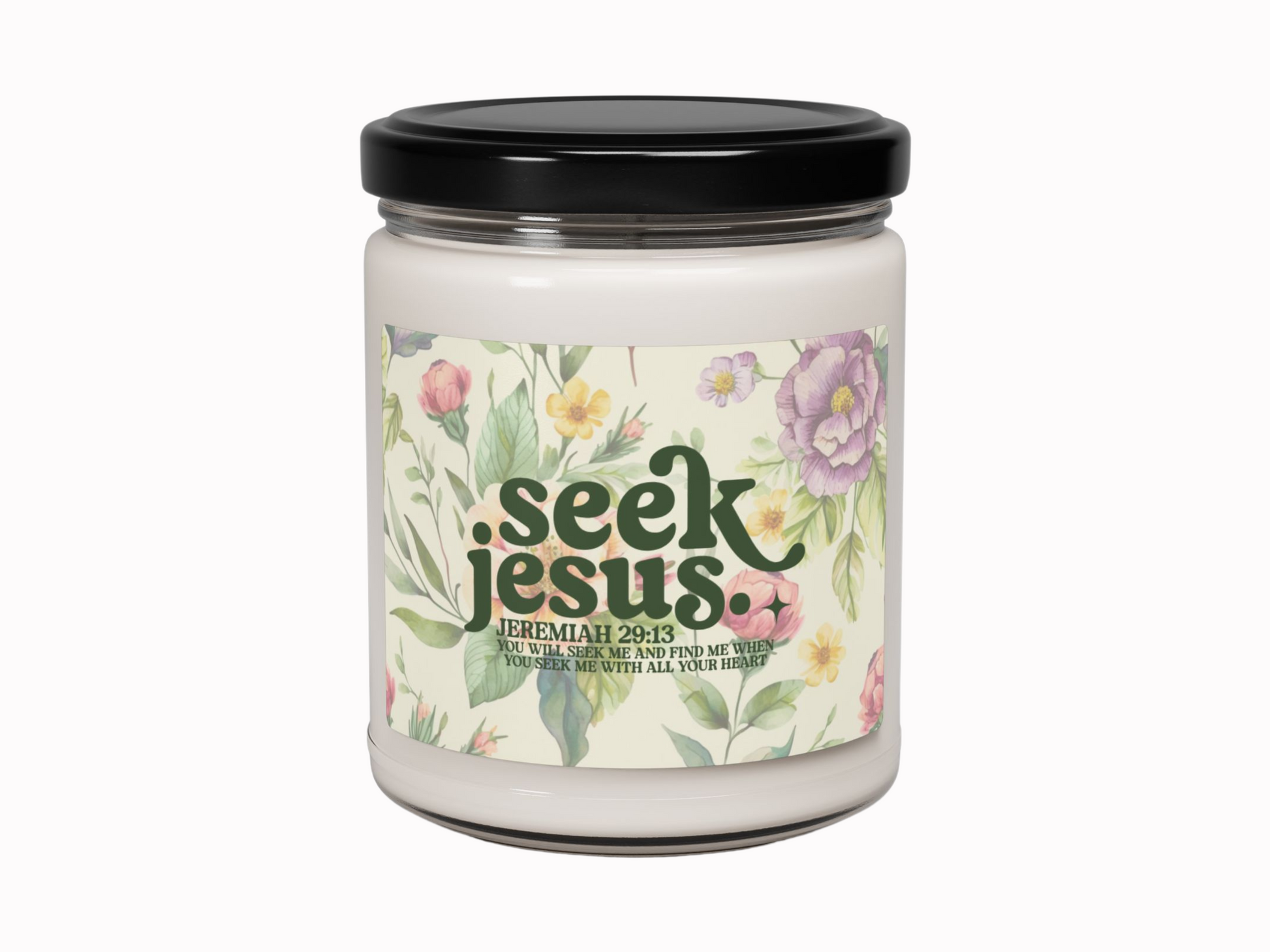 Glass soy candle with bible verse with floral design and "Seek Jesus" text in green. Includes Jeremiah 29:13 scripture, conveying a calm, spiritual tone.