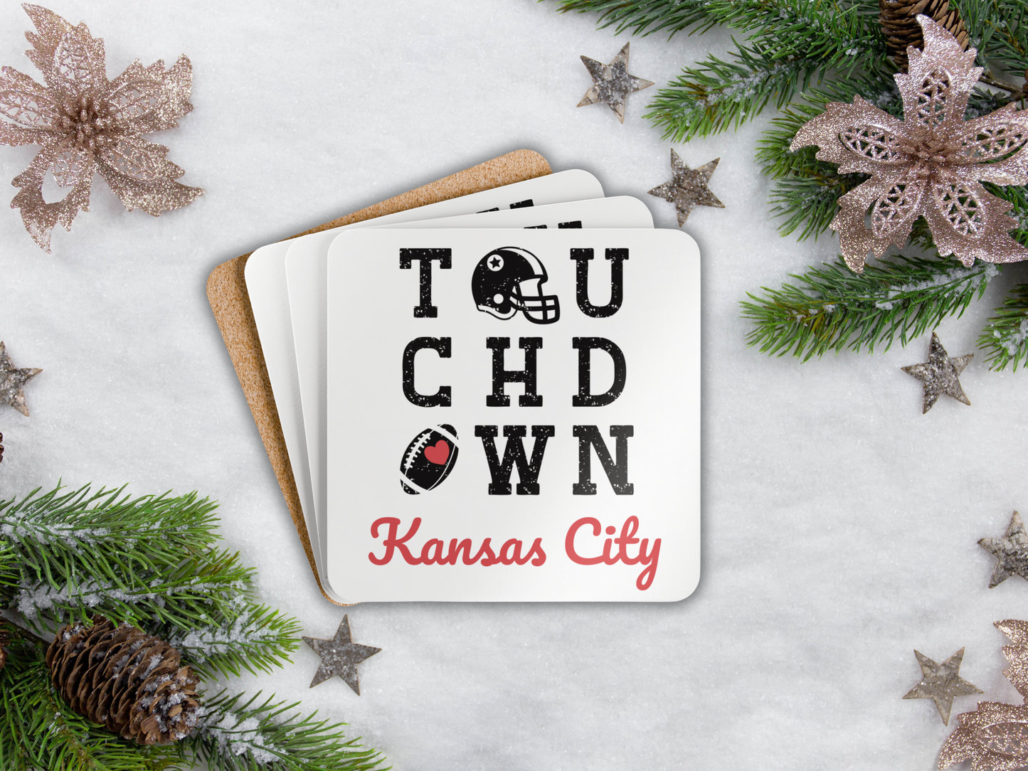 Coaster with 'Touchdown Kansas City' text on a snowy background with Christmas decorations