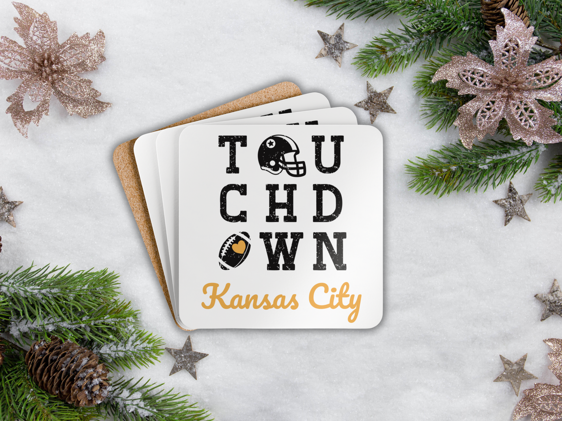Coaster set with 'Touchdown Kansas City' text on a decorative background with Christmas elements.