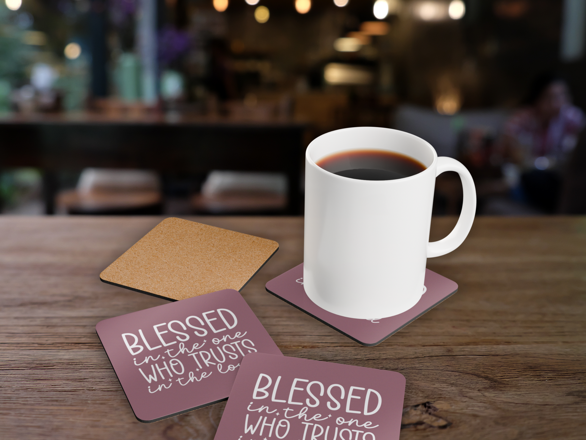 Coasters in a cozy café scene with a white mug of coffee, highlighting cork back and design.