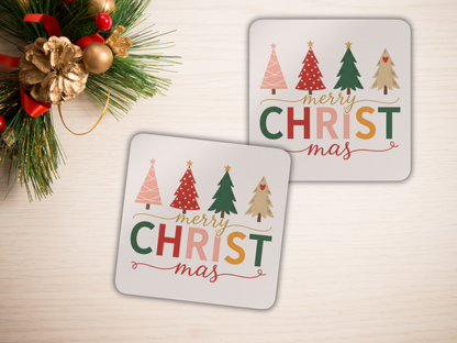 Two Christmas-themed coasters with colorful tree designs and 'Merry Christmas' text on a light background.