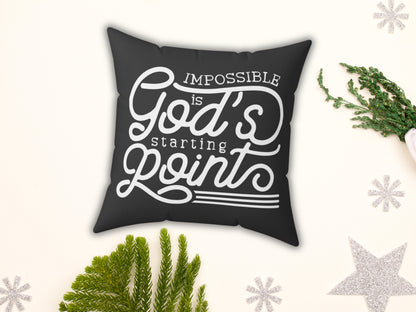 Black pillow with 'Impossible is God's Starting Point' text on a white background with decorative elements.