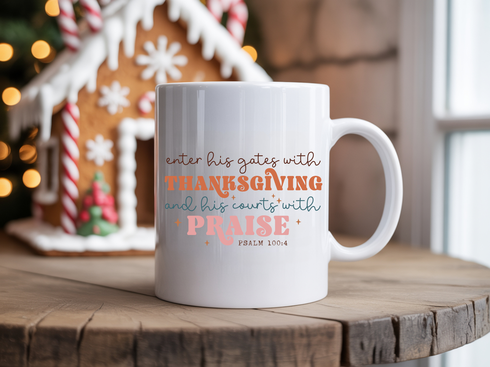 White mug with inspirational quote on a wooden table with festive background
