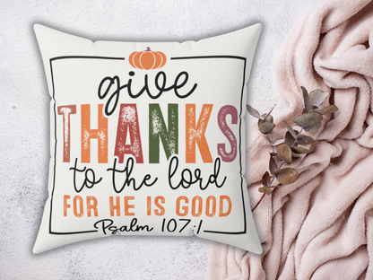 Fall scripture pillow styled on soft blush throw with eucalyptus sprig against a light textured background.