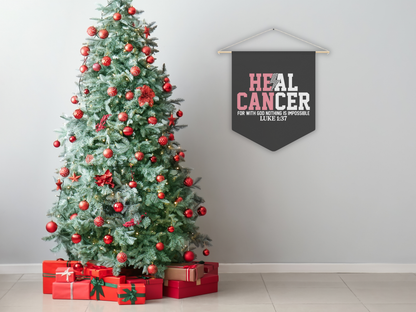 Decorated Christmas tree with red ornaments and presents, and a 'Heal Cancer' banner on a plain wall.
