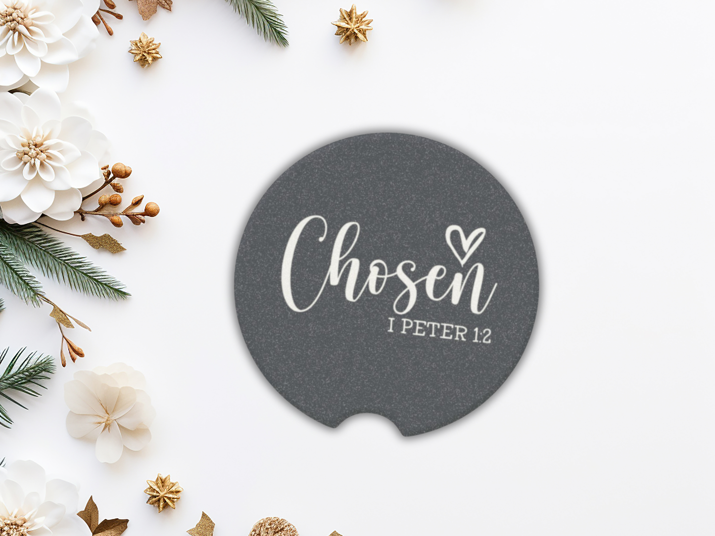 Round navy coaster with 'Chosen I Peter 1:2' text on a decorative background with flowers and greenery.