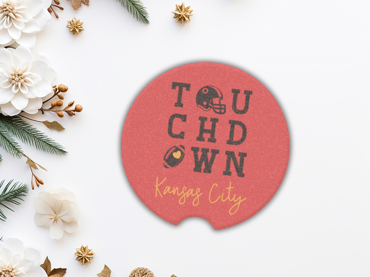 Red car coaster with 'Touchdown Kansas City' text on a white background with decorative elements