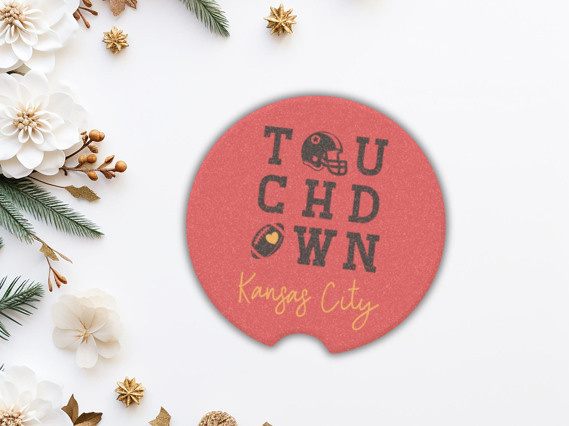 Red car coaster with 'Touchdown Kansas City' text on a white background with decorative elements