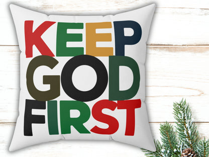 Decorative pillow with 'KEEP GOD FIRST' text on a white background
