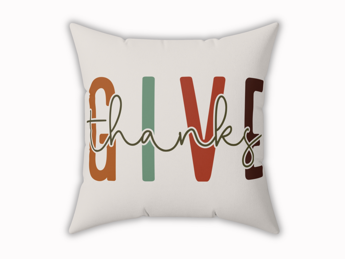 Decorative pillow with the words “Give Thanks” in bold fall colors on a white background. The design conveys a warm, festive, and grateful tone.