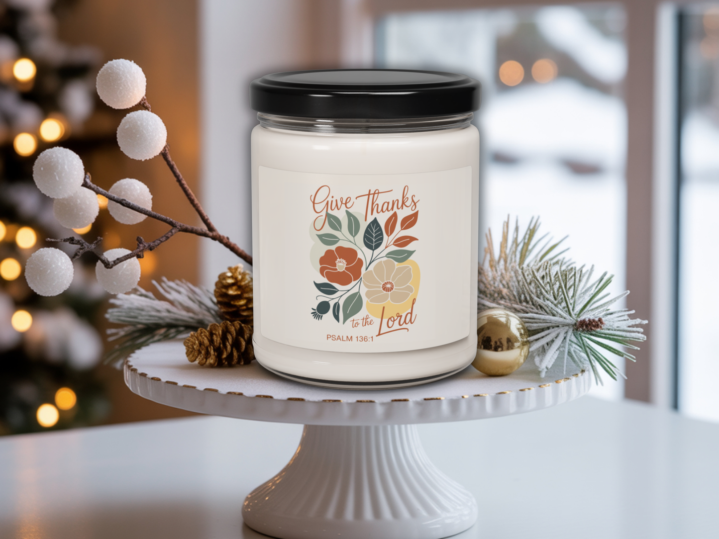 Candle jar with decorative label on a white stand with festive decorations