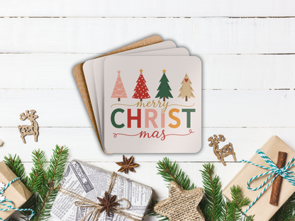 Stack of Christmas-themed cards with decorative elements on a wooden surface