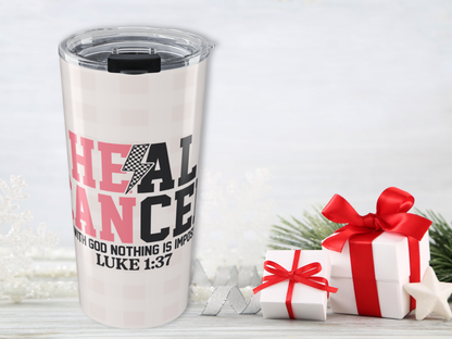 Tumbler with motivational quote and Christmas presents on a white background