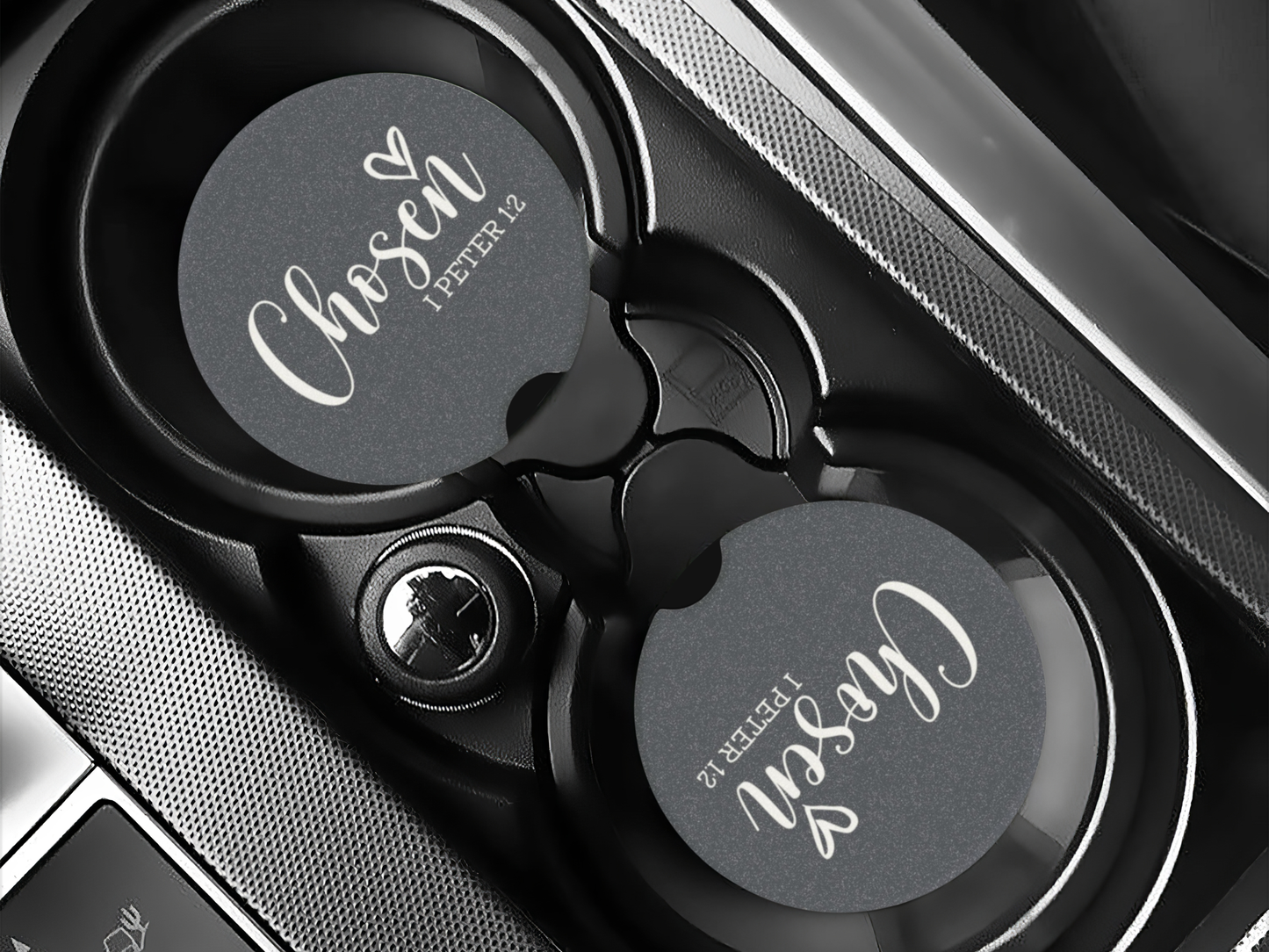 Car phone holder with 'Chosen' branding on a car dashboard