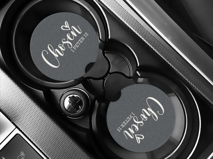 Car phone holder with 'Chosen' branding on a car dashboard