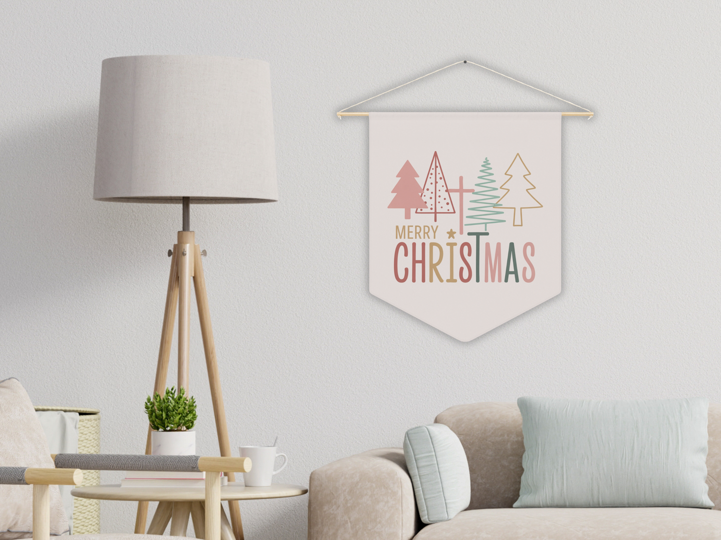 Hanging Christmas banner with trees and 'Merry Christmas' text in a living room setting.