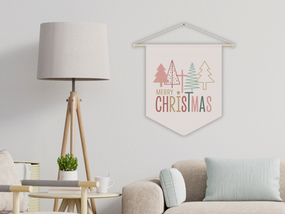 Hanging Christmas banner with trees and 'Merry Christmas' text in a living room setting.