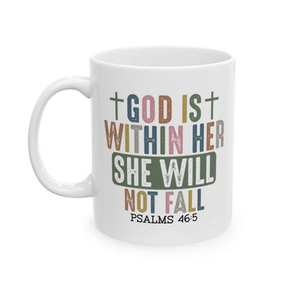 White mug with motivational quote 'God is within her, she will not fall' in colorful letters on a white background