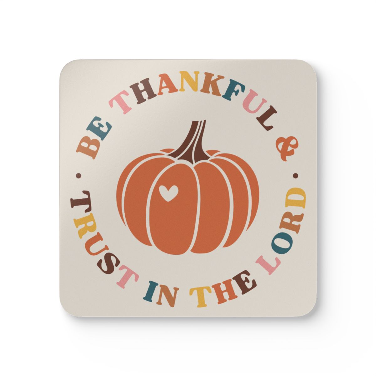 Coaster with pumpkin design and text 'Be Thankful & Trust in the Lord' on a beige background