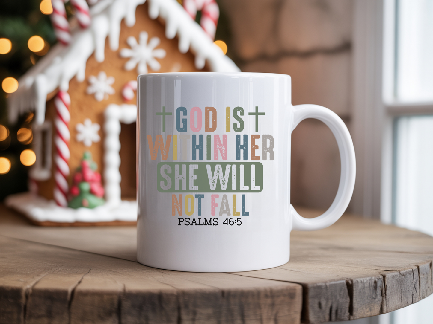 White mug with motivational quote on a wooden surface with a festive background