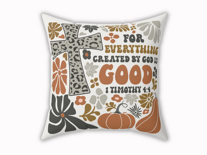White throw pillow with leopard print cross, pumpkins, flowers, and scripture text “For everything created by God is good – 1 Timothy 4:4.”